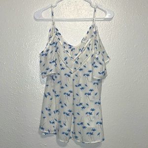 A casual flowy shirt, light blue flowers, size large.